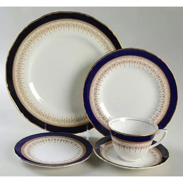 Beautiful elegant set of Royal Worcester fine Bone China in the discontinued "Regency" blue pattern, made in England. This...