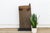From the Voltaic-speaking regions of southern Burkina Faso, this single-plank door is carved with a bold X motif set...