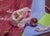This oil on panel artwork presents a detailed still life featuring a skull alongside a lustrous copper sphere, set against...