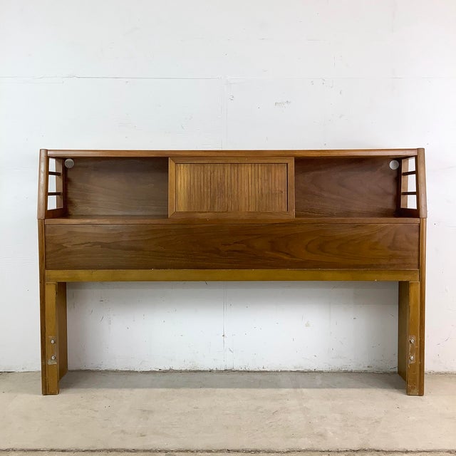 This mid-century modern full-size walnut headboard offers a clean, functional, and quietly architectural design that...