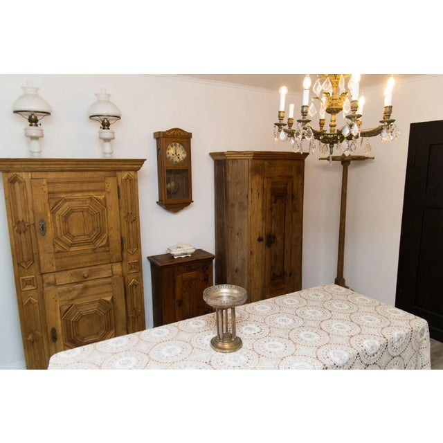This unique and antique one-door Baltic pine wardrobe was handcrafted in the early 19th century. The door inside is dated...