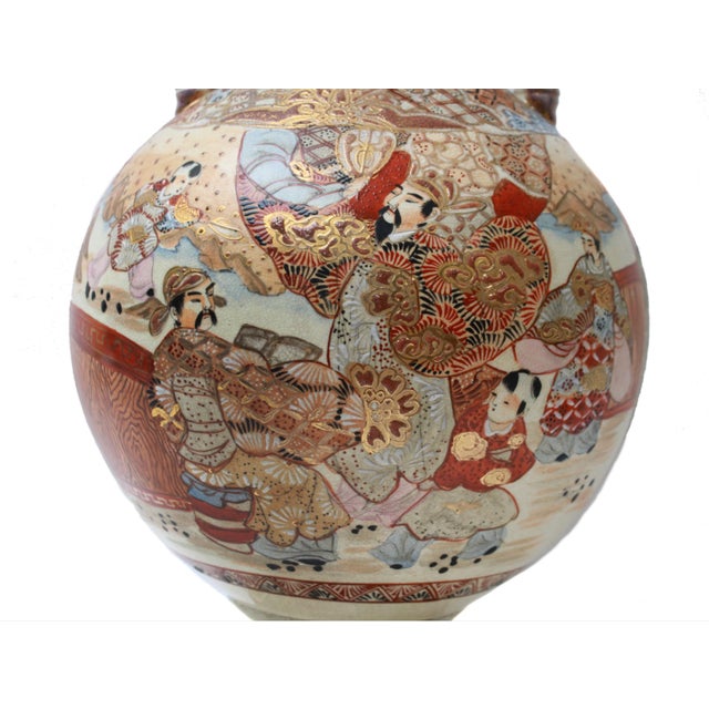 Elevate your collection with this magnificent Antique Japanese Satsuma Earthenware Figural Vase. Dating back to the Meiji...