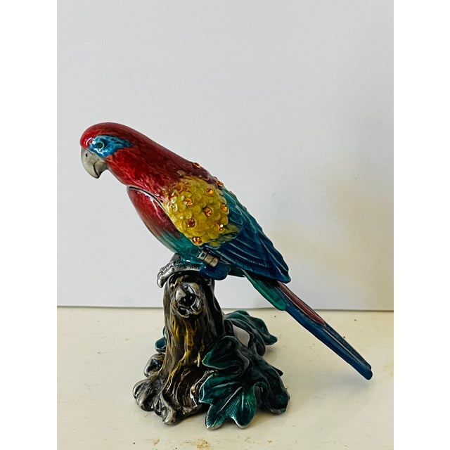 Multicolor enameled and embellished with Swarovski crystals parrot bird sculpture that opens into a jewelry box. Not...