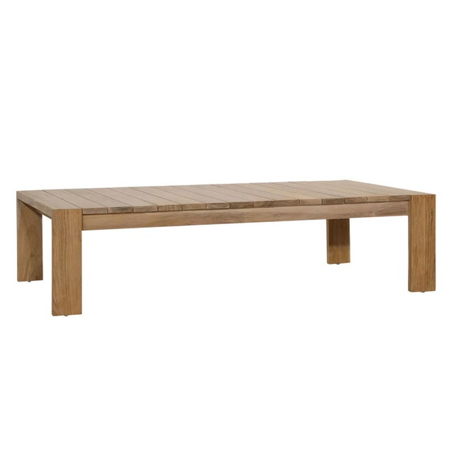 Simple contemporary teak wood coffee table with slatted top. Each table will have variations in natural wood tones, grain,...