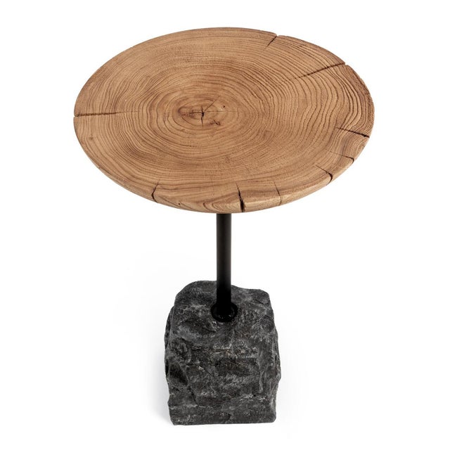 A striking balance of organic materials and sculptural design, this side table showcases the raw beauty of nature through...