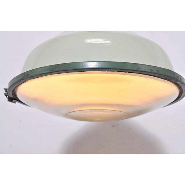 Beautiful enamelled lamps from the 50s with a convex glass plate. Cool color! Dimensions: diameter 42 cm / H48 cm /...