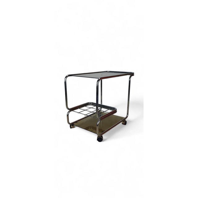 Discover the charm of the 70s with this Space Age drinks trolley. This elegant piece combines functionality with a...