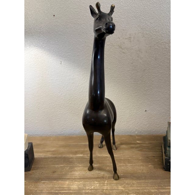 Antique bronze finish. Elegant giraffe. Hollow. No visible signature. 17” Tall x 12” x 4” W