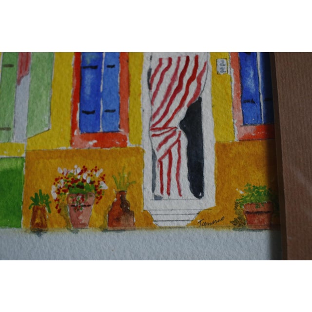This original mid-century expressionist-style watercolor depicts the iconic canal houses of Burano, Italy. This small,...