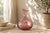 Hand-blown art-glass vase dating to the 1990s, in a soft amethyst-mauve colour. Bullicante-style bubble inclusions run...