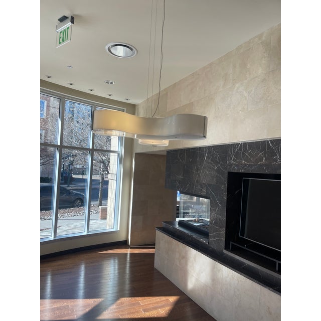 All glass white ceiling Light. No dents or scratches . Meticulouly taken care of. From a high end aspen estate. Taken down...