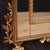 Elegant Italian mirror from the second half of the 20th century. Finely carved and gilded wooden furniture, in Louis XVI...