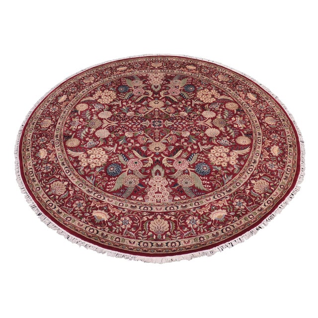 This hand‑knotted Pak Persian round rug showcases the finest expression of traditional Persian artistry. Each piece is...