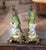Pair of antique porcelain and ormolu parrot candlesticks crafted in China circa 1950. Each sculptural piece features a...