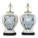 Pair of Vintage Hand Painted Blue and Cream Ceramic Table Lamps With Deer and Floral Folk Art Design For Sale