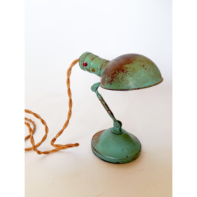 Industrial chic antique turquoise desk or task lamp by Gacor, called the "Handilamp Jr." It has a fold out tab under the...