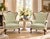Vintage French Louis XV style carved wood wingback bergère chairs featuring dramatic serpentine backs, exposed carved wood...
