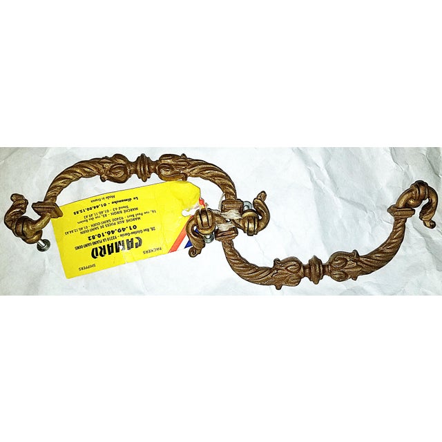 Royalty worthy French 23k gold plated bronze dore' drawer pulls from the mid 20th c. Twisted rope Louis XVI style with...