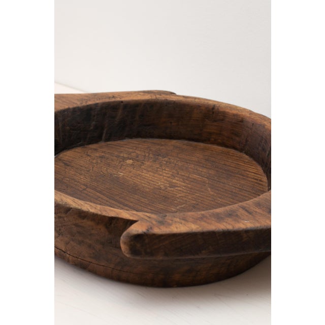 Circular parat bowl with triangular handles Northern India, 2000's wood DIMENSIONS 3.75 h x 20 w in