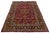 Beautiful vintage Persian Kashan hand-knotted wool rug with a red field. This piece has multicolor accents in a rosette...