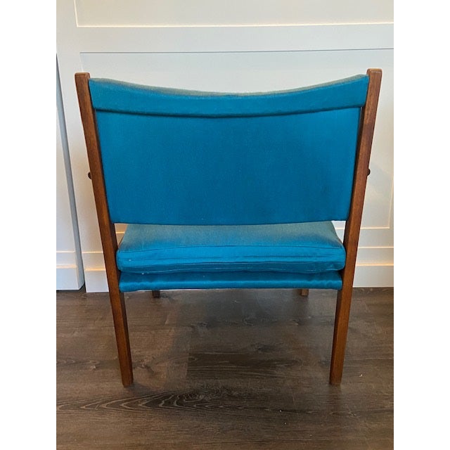 Newly redone, beautiful mid century modern chair with a walnut frame. Chair recently reupholstered in a stunning dark teal...