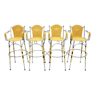 Late 20th Century French Country Wrought Iron Woven Vinyl Rattan Bar Stools With Arms - Set of 4 For Sale