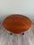 Drop-leaf table in solid wood elegant drop-leaf table in solid wood, resting on four turned legs with brass casters. its...