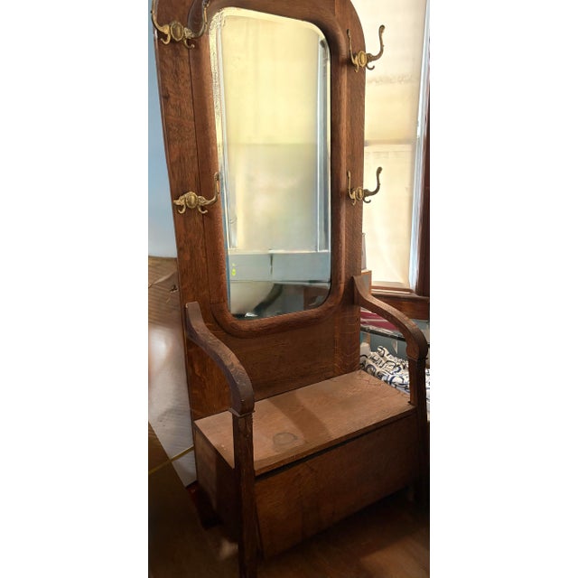 Turn-of-the-Century Victorian Carved Oak Hall Tree Bench With Original Brass Hardware & Mirror For Sale - Image 10 of 12
