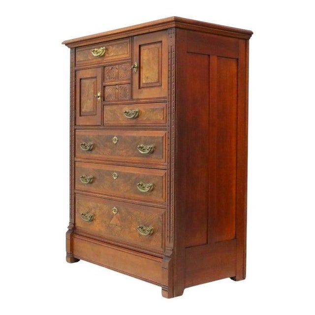 This antique gentleman's chest exemplifies the distinctive Eastlake Aesthetic Movement, dating to circa 1890. Crafted from...
