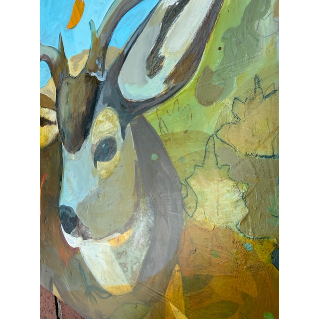 This 18” square painting is full of layers and glazes, collage and mixed media. The mule deer buck is beautiful with a...