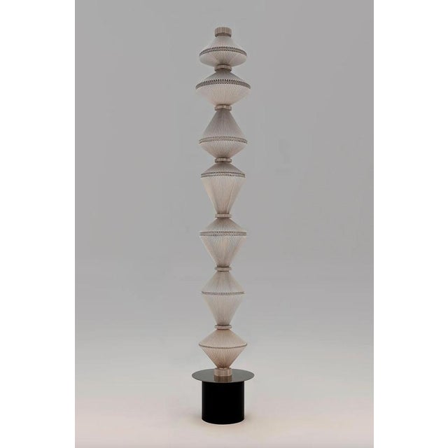 Atelier oï oïphorique p gr suspension lamp for parachilna oïphorique displays an elegant textile diffuser. After turning...