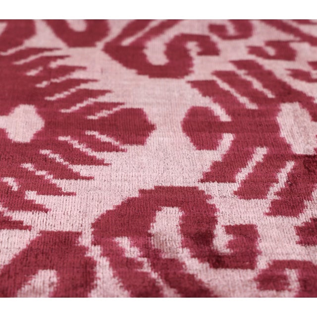 "A soft expression of timeless elegance, this handmade velvet pillow features a delicate Ikat motif in layered shades of...