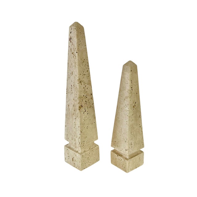 Set 2 mid century travertine marble obelisks. Graduated sizes. Tallest: 13” height, 2.25” wide, smallest: 9” height, 1.2”...