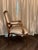 This is a vintage bergère or fauteuil style armchair from Chateau d’Ax Spa (or Chateau d’Ax S.p.A.), an Italian furniture...