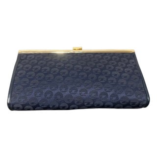 1980s Blue Fabric and Brass Italian Continuous Logo Clutch by Zenith For Sale