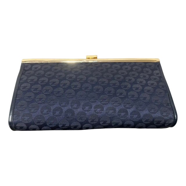 1980s Blue Fabric and Brass Italian Continuous Logo Clutch by Zenith For Sale