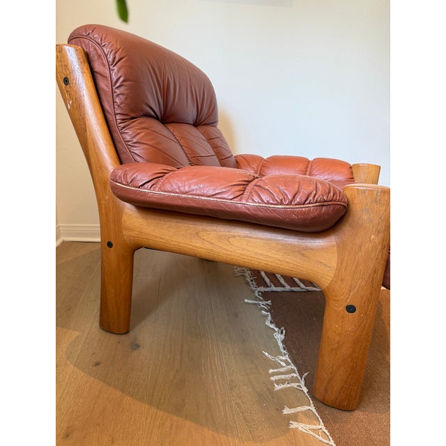 Mid-Century Modern Teak & Leather Framed Armchair. There are no markings but I believe it is the Ekornes Montana chair...