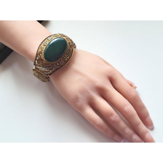 A beautiful antique silver filigree bracelet with a large natural bloodstone (heliotrope). The bracelet is in very good...