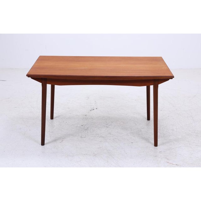 Vintage teak boomerang dining table, "Model 371," by Alfred Christensen, a Danish design from the 1960s with a clean, calm...