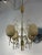 This 4-light chandelier by Almari Mauri of Finland, in brass, glass and faceted crystals. Beautiful vintage piece with a...