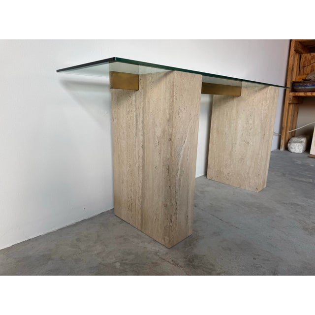 Elegant and architectural, this Italian Postmodern console table designed by Guy Barker for Ello exemplifies the refined...