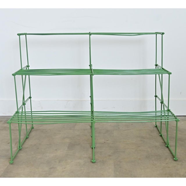 A vintage French metal plant stand from the early twentieth century, recently updated with a new powder-coat finish of...