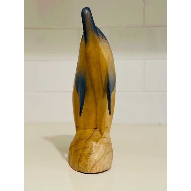 Delightful hand carved all wood Dolphin vintage figure. Natural and blue stained smooth wood. In excellent condition...