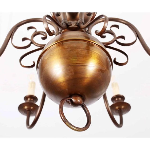 Six-arm chandelier decorated with a flemish eagle. The chandelier is in very good condition. Checked electrical...