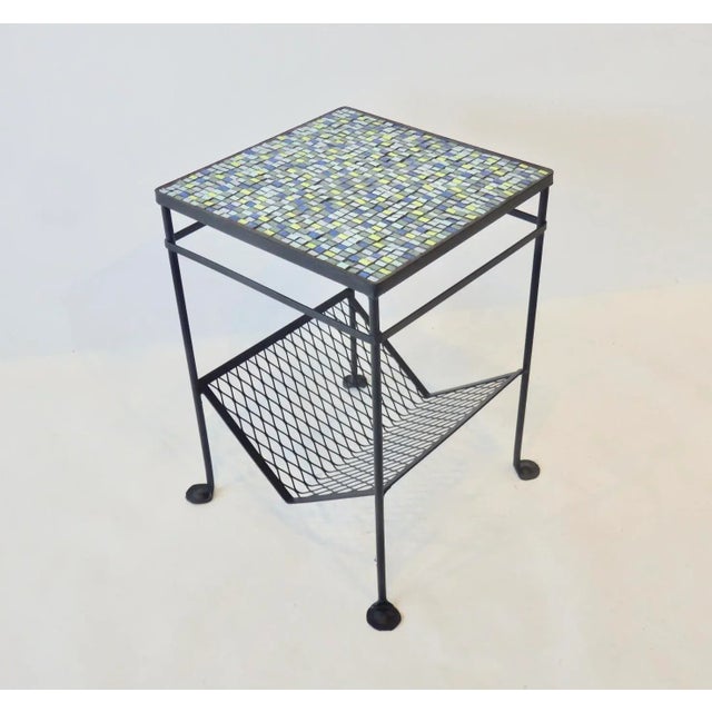 A one of a kind handcrafted mosaic top table made with thick Italian smalti tile on a restored vintage wrought iron frame...
