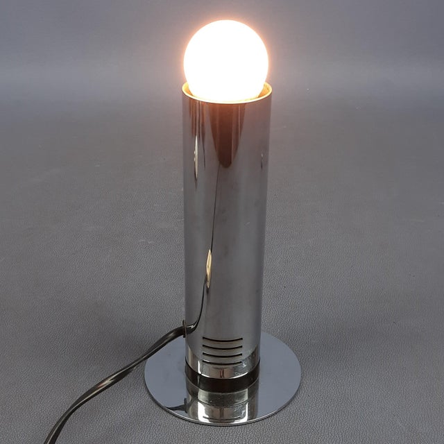 Stunning Italian modern table lamp, made of chromed steel, Targetti Sankey design, excellent workmanship, very scenic and...