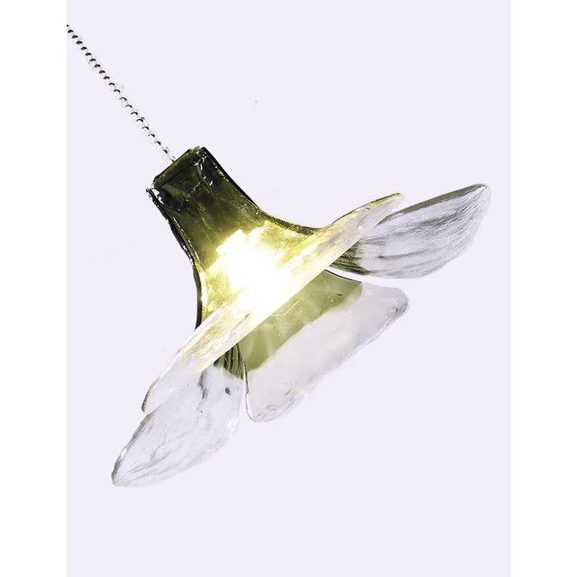 Elegant tulip pendant light with green and clear murano glass blades on a partly chromed and nickel hardware designed by...