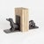 This playful, yet dignified creature is created by a cast aluminum sculpting method. A detailed dachshund bookend design...