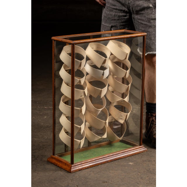 c. 1910s-1920s; C. W. Ferguson Collar Co. - Troy, NY Antique oak and glass counter display case containing a full...