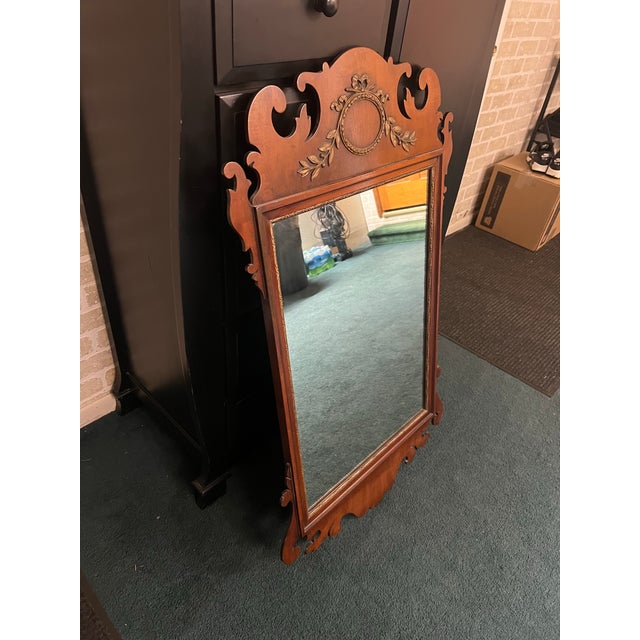 This authentic Kindel Furniture Company “Oxford” mirror is a fine example of American Chippendale-style craftsmanship,...